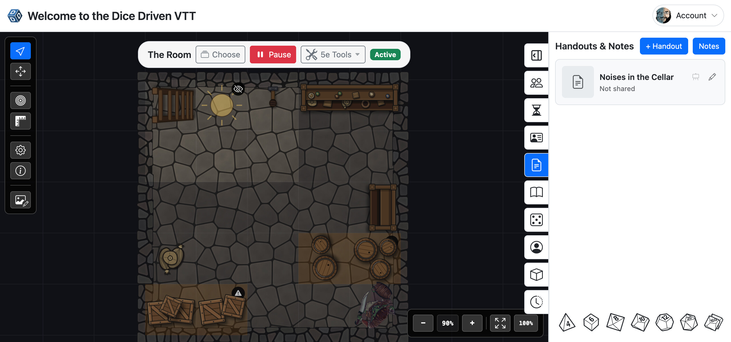 Dice Driven VTT: a cellar battlemap with crates, barrels and a goblin miniature, with the GM's tools, handouts and dice around it